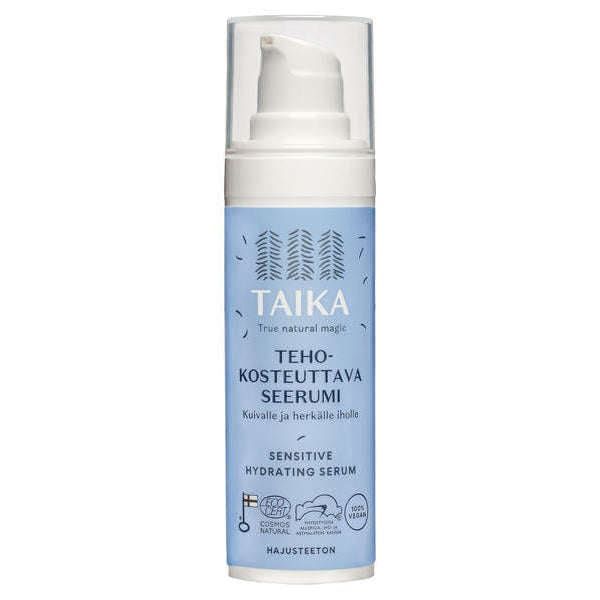 Taika Sensitive Hydrating Serum comes in a pump-top bottle with a light blue label, white text, Finnish details, and a tree design. Icons show it’s a moisture serum from Taika for sensitive or dry skin.