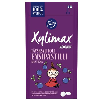 Fazer Xylimax Moomin Blueberry Full Xylitol Pastilles come in a purple box with Moomin among blueberries, highlighting 100% xylitol for dental health.