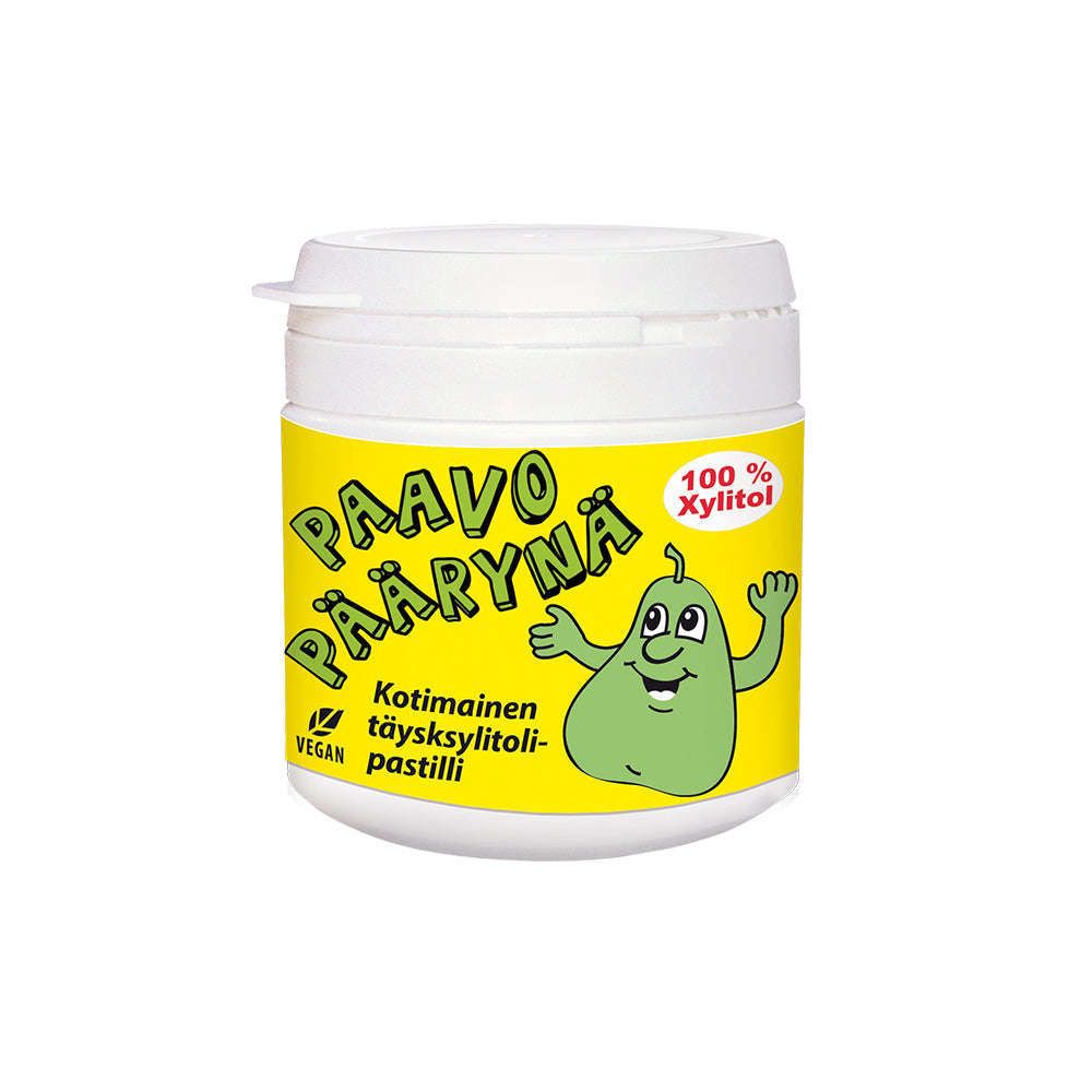 A white Vitabalans container with a yellow label shows a cartoon green pear, Finnish text "Paavo Päärynä," and a red "100% Xylitol" bubble. These sugar-free xylitol pastilles support dental health and are labeled vegan.