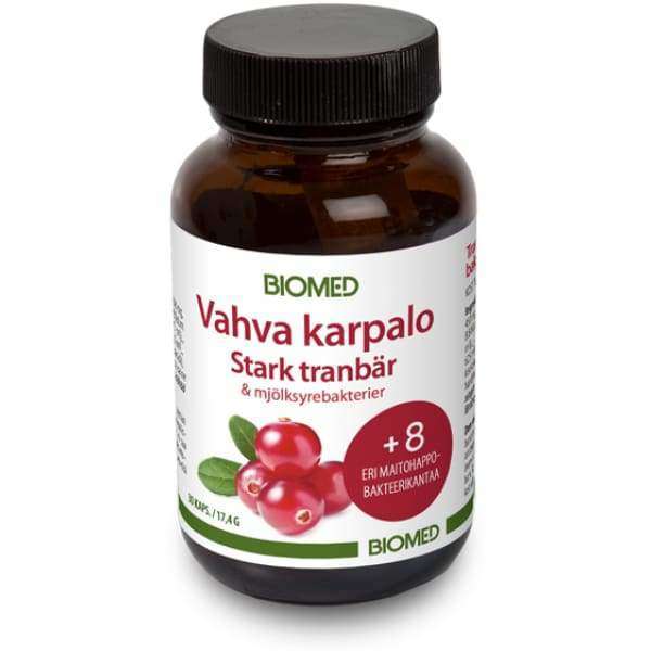 A bottle of BIOMED Vahva karpalo Stark tranbär & möylysäyrebakterit supplement, featuring an amber glass bottle with a black cap and a white label with red and green text and cranberry graphics.