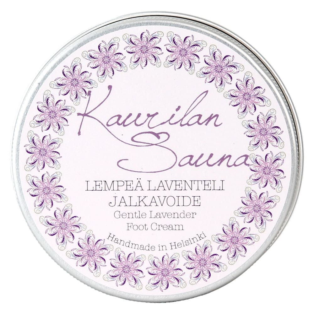 A round tin labeled Kaurilan Sauna Gentle Lavender Foot Cream, handmade in Helsinki, features decorative lavender flowers around the edge and text in Finnish and English.