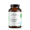 Brown supplement bottle labeled 'puhdas+' with 'Chlorella & Spirulina' on a white background