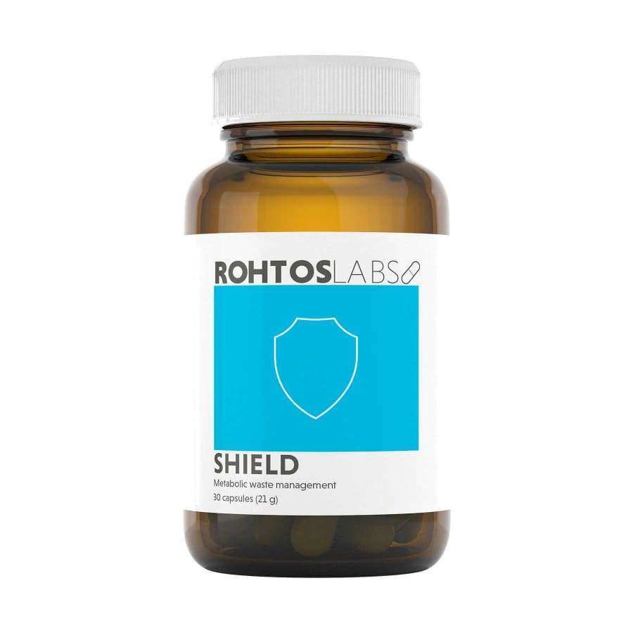 A brown bottle featuring a white and blue label with Rohtos Labs Shield branding, a shield icon, and text indicating 30 capsules for metabolic waste management and immune support.