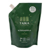 A green refill pouch of Taika Liquid Hand Soap by Taika, with white text, forest design, and labels showing the gentle vegan soap is natural, carbon neutral, and uses 80% less plastic than regular packaging.