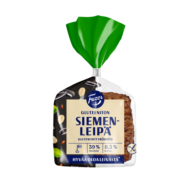 Ein Laib Fazer Seed Bread Gluten-Free von Fazer ist in einer durchsichtigen Verpackung mit grünem Drehverschluss zu sehen. Auf dem Etikett in Finnisch und Schwedisch sind Nüsse und Samen abgebildet. Dieses ballaststoffreiche Brot ist glutenfrei.