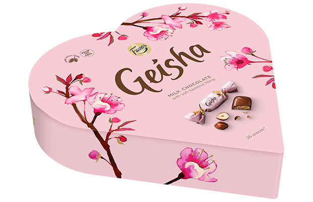 Die Fazer Geisha Gift Box ist eine herzförmige, rosafarbene Schachtel mit finnischer Schokolade, verziert mit Kirschblüten, dem Geisha-Logo und Bildern von Milchschokolade mit Haselnussfüllung von Fazer.