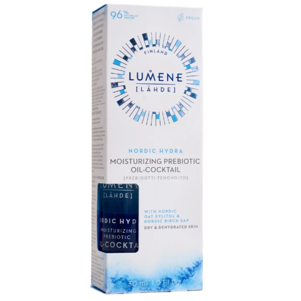 Eine rechteckige Dose Lumene Nordic Hydra Moisturizing Prebiotic Oil-Cocktail mit blauem und weißem Design, das die feuchtigkeitsspendenden Vorteile für trockene und dehydrierte Haut hervorhebt.