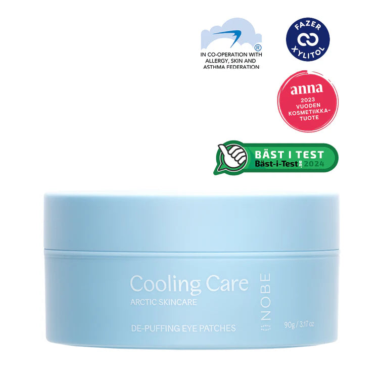 Ein hellblauer Tiegel mit der Aufschrift NOBE Nordic Cooling Skincare Rituals by NOBE Nordic Beauty, mit Zertifizierungs- und Preislogos darüber - darunter Bäst i Test 2024 und Anna 2023 Vuoden Kosmetiikkatuote - ein perfektes nordisches Hautpflege-Geschenkset.