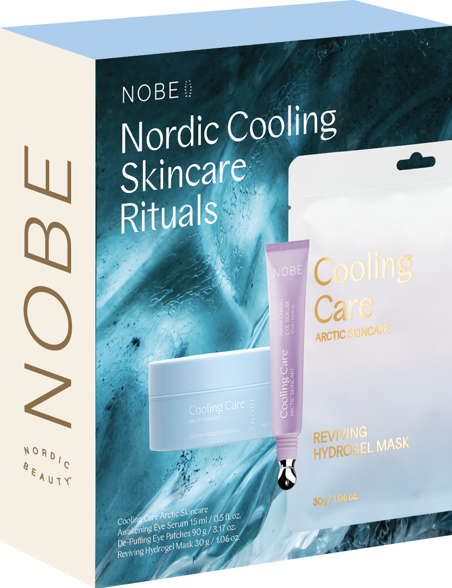 Das NOBE Nordic Cooling Skincare Rituals Geschenkset von NOBE Nordic Beauty hat eine schlichte, hellblaue und weiße Verpackung mit einer Tube, einem runden Tiegel und einem Beutel, die ein Augenserum, Hydrogel-Augenpflaster und eine Hydrogel-Maske enthalten.