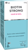 Eine blau-weiße Schachtel mit Vitabalans Biotiini Strong Hair & Nail Tabletten, einem Biotinpräparat mit Keratin, enthält 60 Tabletten (13,8 g). Auf der Verpackung sind finnischer und englischer Text, Markenlogos und Produktangaben zu finden.