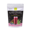 Ein Beutel Elixi Hanfprotein & Ballaststoffe Shake Heidelbeere. Auf der Verpackung sind ein Glas lila Smoothie, Hanfblätter, Heidelbeeren und Hanfpulver abgebildet, auf der Vorderseite sind Produktdetails in finnischer Sprache angegeben. Marke: Elixi.
