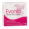 Une boîte de Hankintatukku Evonia contient 56 capsules d'oméga-3, formulées en Finlande pour favoriser la santé du cuir chevelu et aider à prévenir la chute des cheveux ; l'emballage rose représente la silhouette d'une femme aux cheveux flottants.