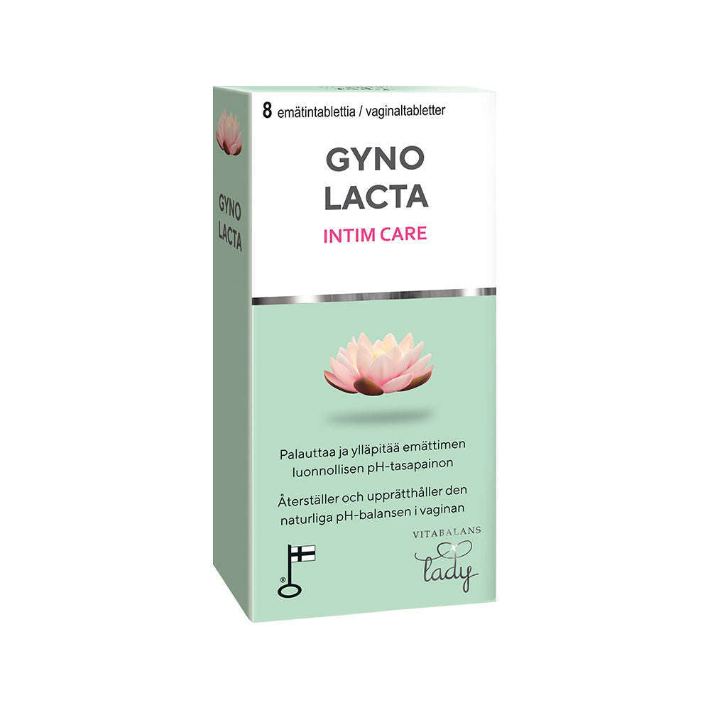 Une boîte de comprimés vaginaux Gynolacta de Vitabalans. L'emballage blanc et vert menthe présente une fleur de lotus rose et un texte en finnois/suédois sur le rétablissement de l'acidité vaginale grâce aux bactéries lactiques.