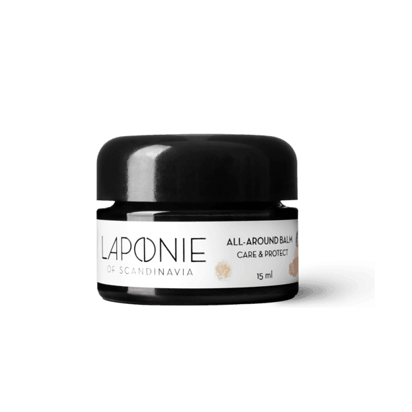 Un petit pot noir de baume Laponie of Scandinavia (15 ml) est présenté sur un fond blanc. Ce baume doux à l'huile d'argan est idéal pour les peaux sensibles.