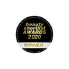 Un badge circolare nero e oro recita "beauty shortlist AWARDS 2020", con un banner bianco e oro "WINNER" nella parte inferiore, che mette in risalto il delicato Milk Cleanser Laponie of Scandinavia, ideale per la pelle sensibile.