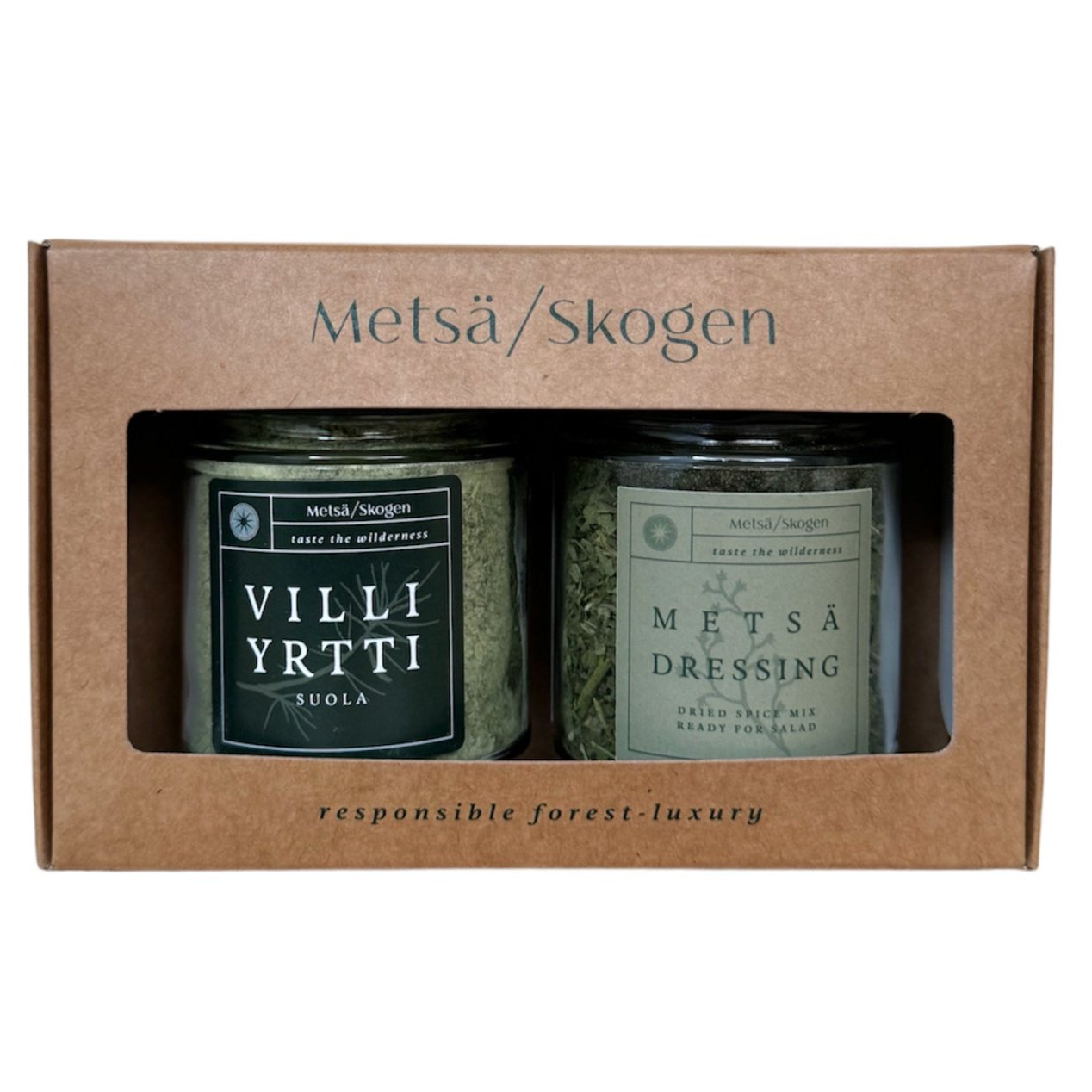 De Metsä/Skogen Forest Dressing & Wild Herb Salt Gift Set bevat twee potjes Fins wild kruidenzout, waarmee u bij elke hap kunt genieten van unieke bosaroma's.