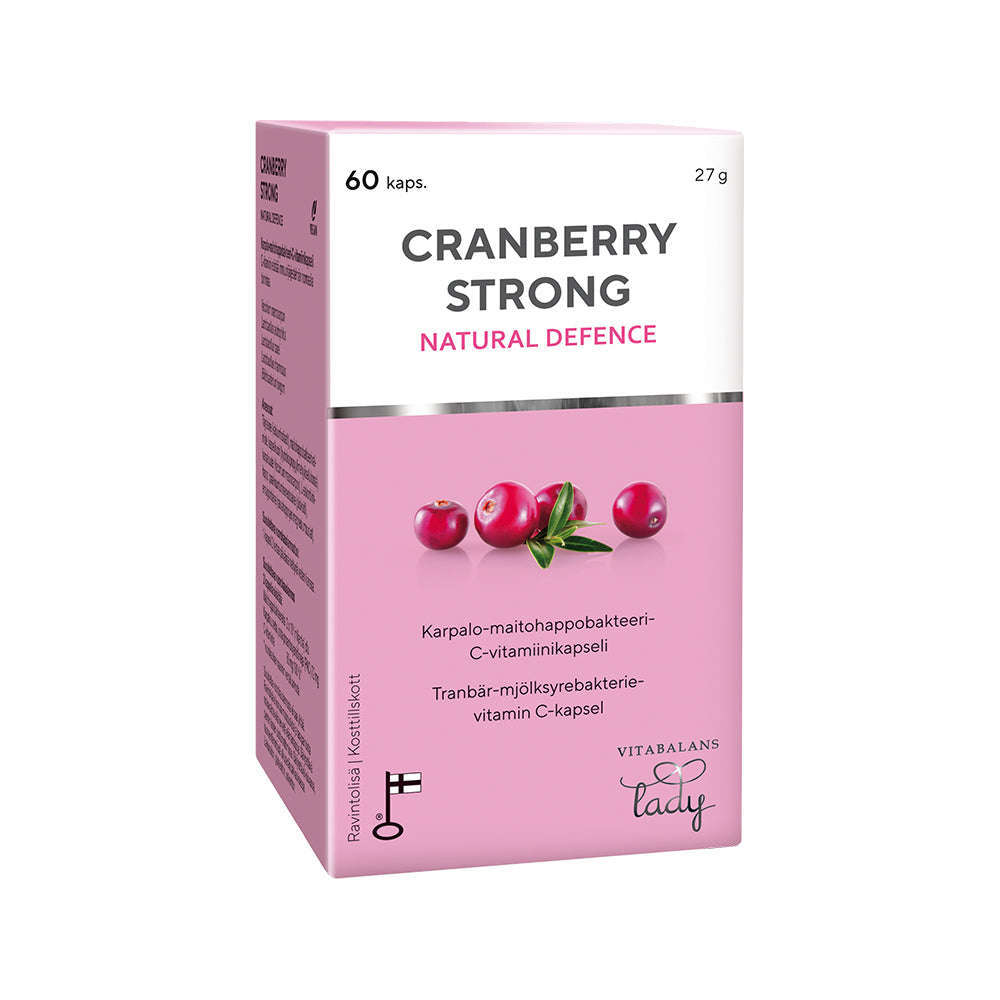 Een roze en witte Vitabalans Strong-doos met cranberries, die de gezondheid van vrouwen bevordert met cranberry-extract, en meertalige tekst.